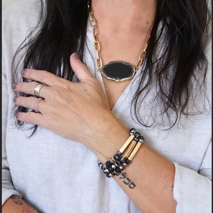 Beaded Bracelets in Black Glass Beads and Gold Tubes